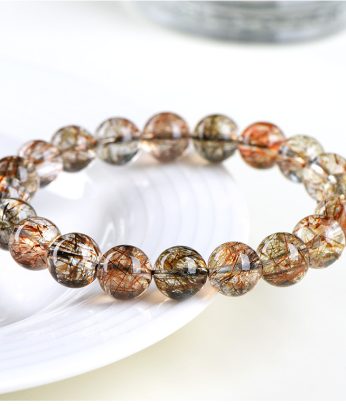 super seven crystal bracelet believed to harmonize all 7 chakras